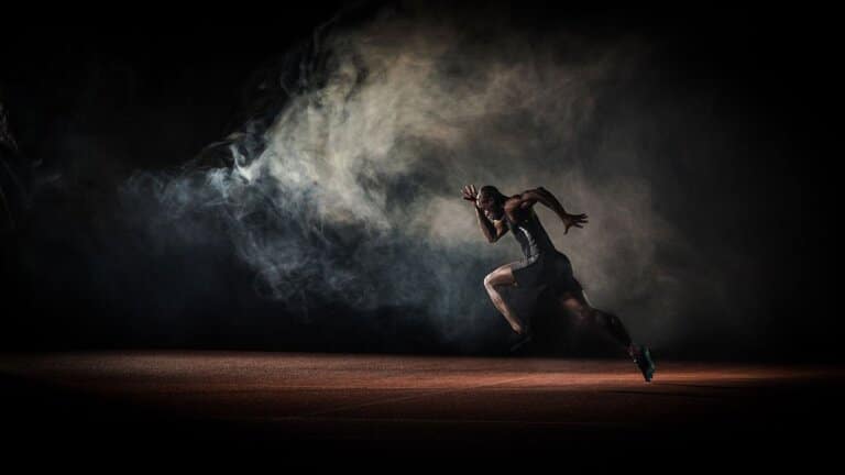 Athlete in motion, running with determination and speed, showcasing athleticism and endurance